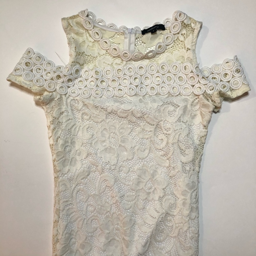 Women’s dress color white size small skin tight